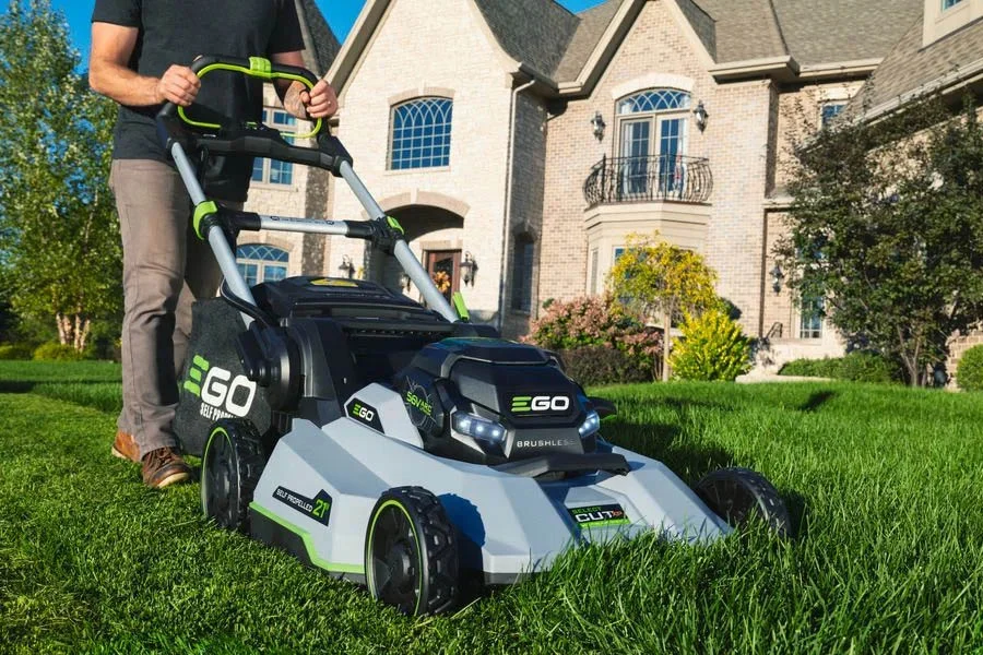 self-propelled electric lawn mower with battery and charger